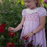 KATHERINE JOHNSON DRESS LOVEHEART LINEN WITH JAMMY DODGER HAND SMOCKING