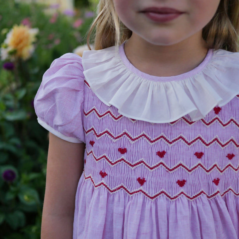 KATHERINE JOHNSON DRESS LOVEHEART LINEN WITH JAMMY DODGER HAND SMOCKING