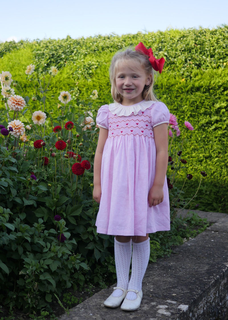 KATHERINE JOHNSON DRESS LOVEHEART LINEN WITH JAMMY DODGER HAND SMOCKING